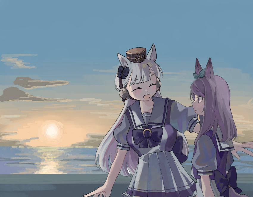 2girls :d animal_ears aqua_ribbon beach blunt_bangs blush bow bowtie closed_eyes cloud collarbone ear_bow gold_ship_(umamusume) grey_hair highres horizon horse_ears horse_girl horseshoe_ornament long_hair looking_at_another mejiro_mcqueen_(umamusume) multiple_girls ocean pillbox_hat purple_bow purple_eyes purple_hair ribbon school_uniform smile sunset tracen_school_uniform umamusume yuta_uma9