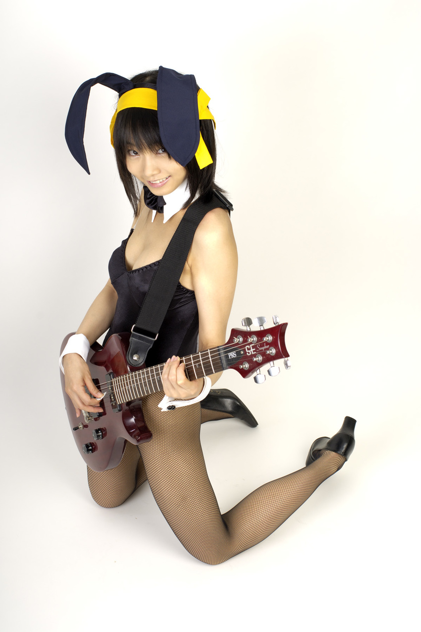 animal_ears asian bow bowtie bunny_ears bunny_girl cosplay costume fishnet_legwear fishnet_stockings fishnets guitar hair_ribbon hair_ribbons highres instrument legwear leotard matsunaga_ayaka photo real ribbon smile smiling suzumiya_haruhi suzumiya_haruhi_no_yuuutsu thighhighs