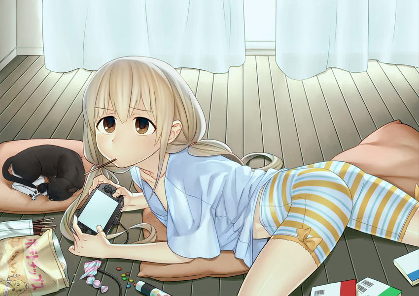 1girl animal bike_shorts blonde_hair brown_eyes candy cat food futaba_anzu harmaline idolmaster idolmaster_cinderella_girls long_hair playing_games playstation_vita pocky striped