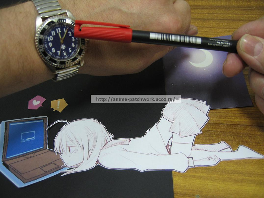 1girl computer heart laptop lying on_stomach paper_child papercraft photo solo_focus tears top-down_bottom-up watch watermark web_address wristwatch
