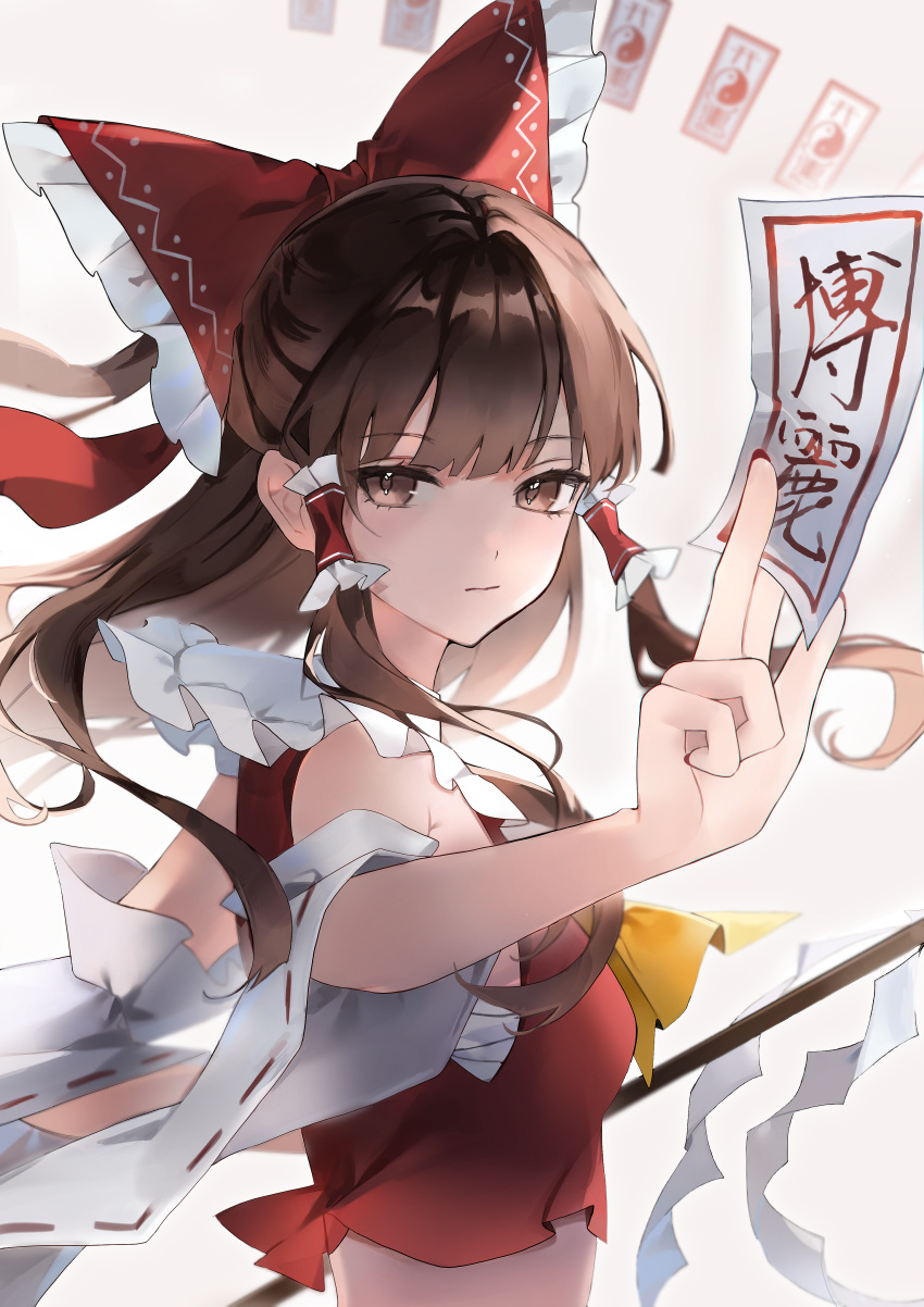 1girl absurdres ascot bare_shoulders bow brown_eyes brown_hair closed_mouth detached_sleeves hair_bow hair_tubes hakurei_reimu hanaya_(fleur) highres japanese_clothes long_hair looking_at_viewer nontraditional_miko ofuda red_bow sidelocks simple_background solo touhou upper_body white_background white_sleeves wide_sleeves yellow_ascot