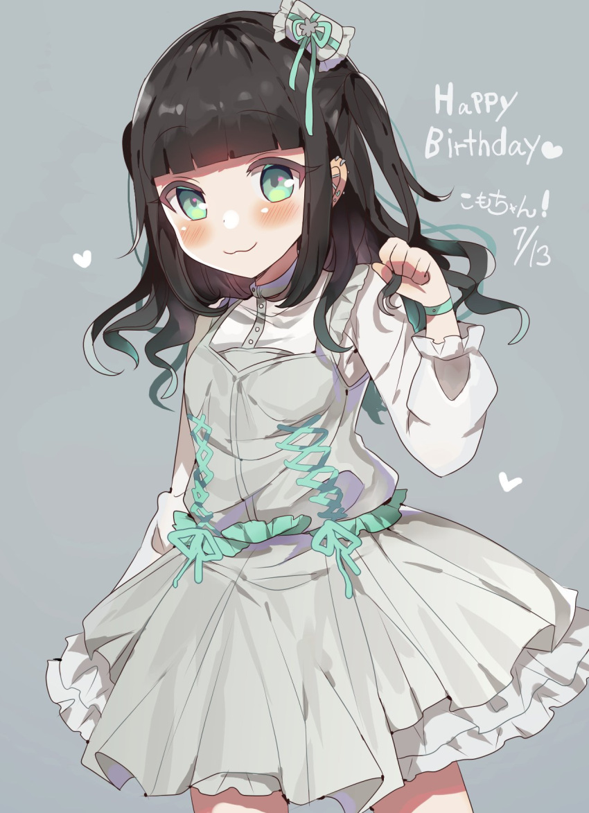 1girl :3 animification black_hair blunt_bangs character_name closed_mouth commentary_request cowboy_shot dress frilled_dress frills green_eyes grey_background grey_dress hand_up happy_birthday highres idol_clothes long_hair long_sleeves looking_at_viewer nene_komochi paw_pose puffy_long_sleeves puffy_sleeves real_life renoa_yu seireki13ya simple_background smile solo standing two_side_up