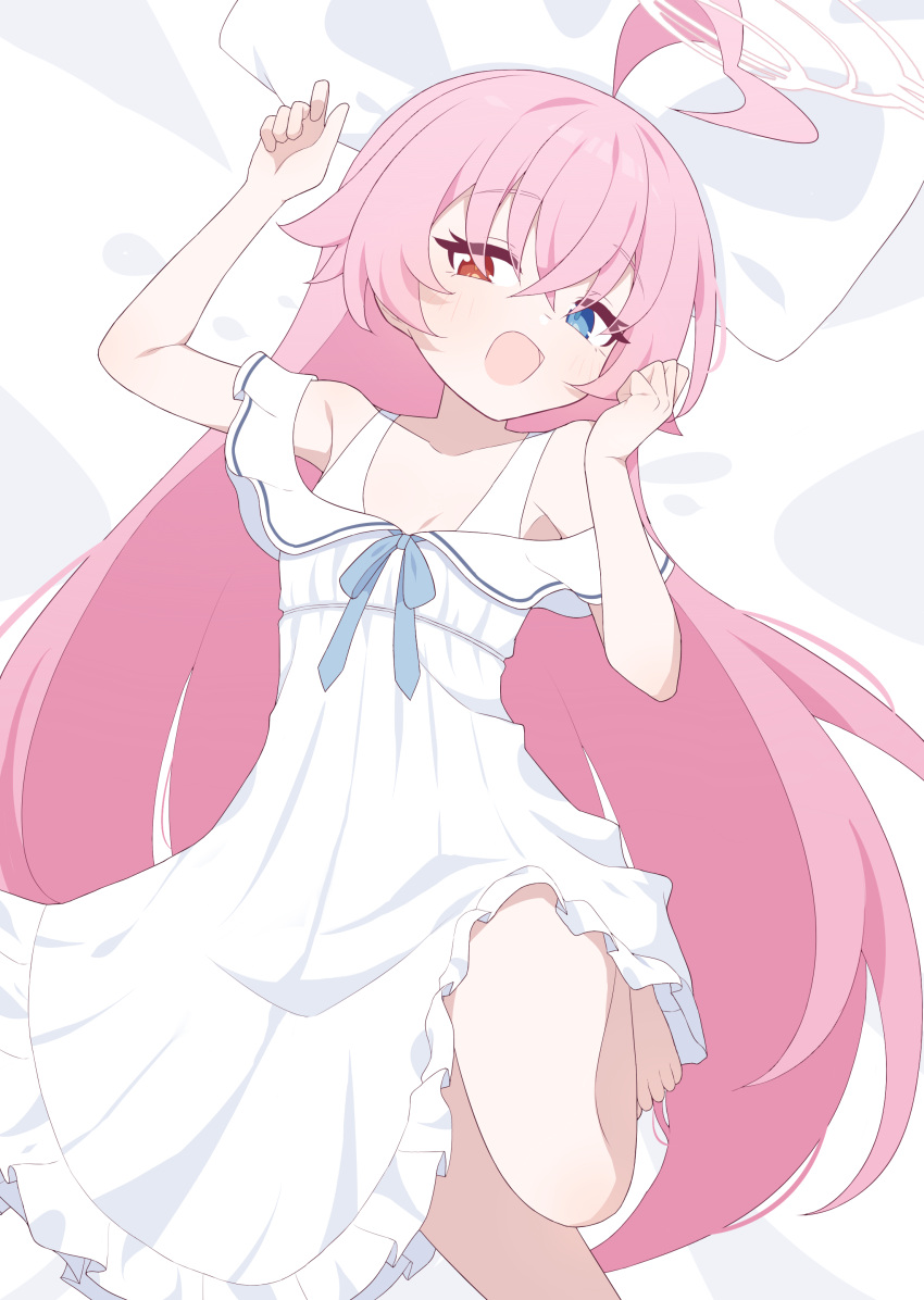 1girl absurdres ahoge barefoot bed_sheet blue_archive blue_eyes blush breasts cleavage dress foot_out_of_frame hagoonha hair_between_eyes halo heterochromia highres hoshino_(blue_archive) long_hair looking_at_viewer open_mouth pillow pink_hair pink_halo small_breasts solo white_dress yellow_eyes