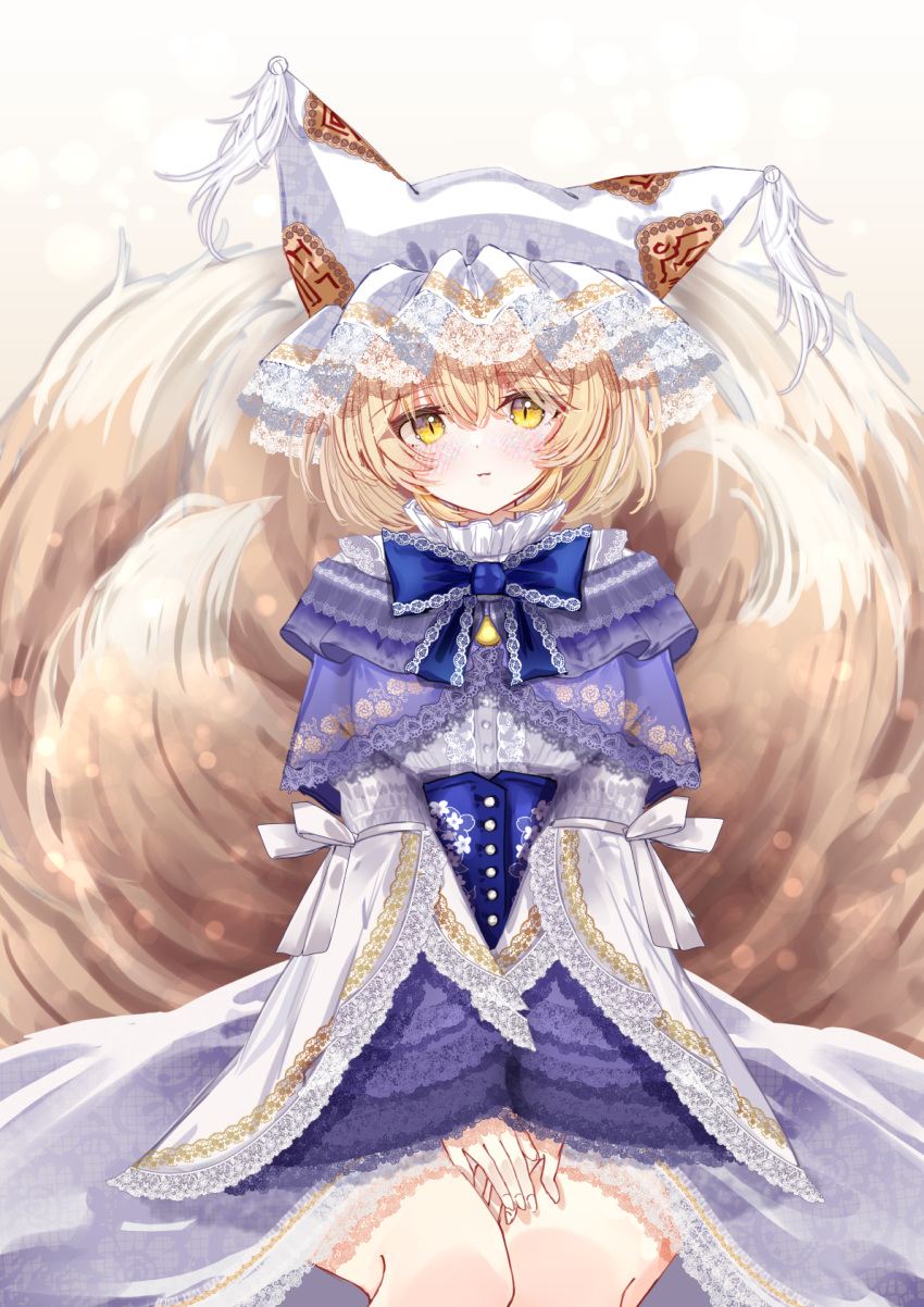 1girl adapted_costume animal_hat blonde_hair blue_corset closed_mouth commentary_request corset dress feet_out_of_frame floral_print fox_girl fox_tail hat highres lace-trimmed_bowtie lace-trimmed_dress lace-trimmed_headwear lace-trimmed_sleeves lace_trim long_sleeves looking_at_viewer multiple_tails own_hands_together sarasadou_dan short_hair simple_background sitting solo tail touhou white_background white_headwear wide_sleeves yakumo_ran yellow_eyes