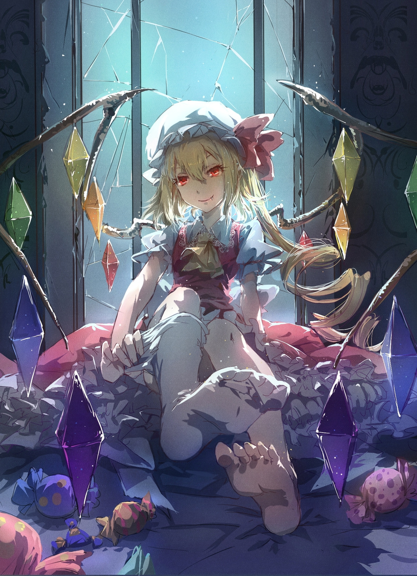 ascot blonde_hair candy crack eyelashes fang fang_out feet flandre_scarlet food frilled_skirt frills hat hat_ribbon highres indoors looking_at_viewer mob_cap puffy_short_sleeves puffy_sleeves red_eyes ribbon shadow short_hair short_sleeves side_ponytail single_thighhigh sitting skirt skirt_set smile solo thighhighs thighhighs_pull touhou window wings yuiko_(yuiko33miao)