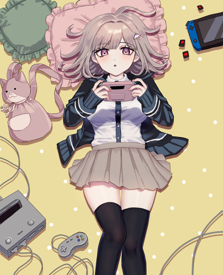 1girl :o animal_bag bag black_shirt black_thighhighs blush brown_skirt cat_bag controller danganronpa_(series) danganronpa_2:_goodbye_despair dress_shirt esu_(tasoesu) from_above galaga game_boy game_console hair_ornament handheld_game_console highres holding holding_handheld_game_console jacket looking_up lying miniskirt nanami_chiaki nintendo_switch on_back open_clothes open_jacket pillow pink_bag pink_eyes pleated_skirt shirt skirt solo thighhighs two-tone_shirt unworn_bag white_shirt zettai_ryouiki