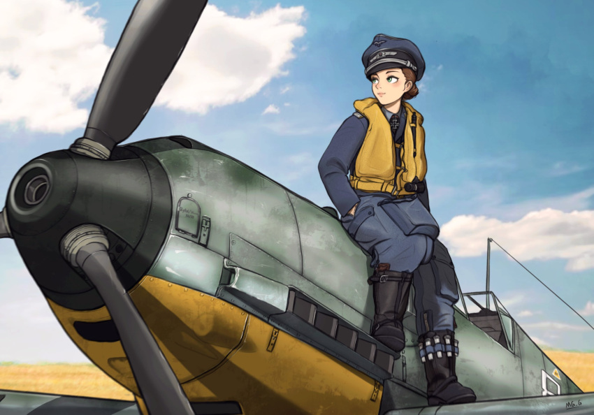 1girl aircraft airplane artist_name blue_headwear blue_jacket blue_pants brown_hair cloud cloudy_sky cross green_eyes highres iron_cross jacket luftwaffe mg_g military_uniform military_vehicle original pants propeller sky smile solo uniform vehicle_request wehrmacht