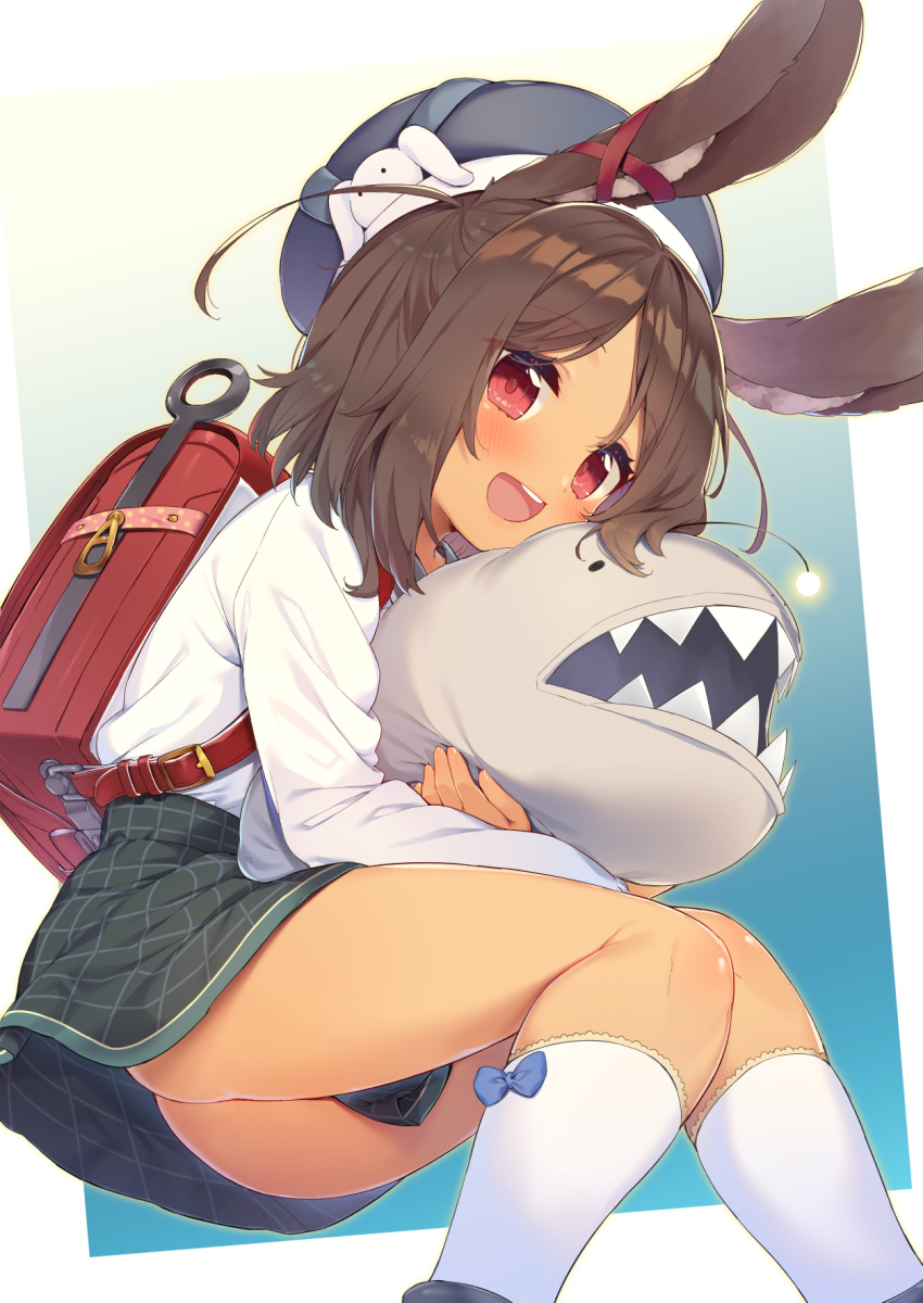 1girl :d animal_ears azur_lane backpack bag bangs beret black_hat blue_background blue_bow blush bow brown_hair bunny_ears commentary_request eyebrows_visible_through_hair green_skirt hat highres i-26_(azur_lane) kneehighs long_hair long_sleeves looking_at_viewer object_hug open_mouth parted_bangs randoseru red_eyes red_ribbon ribbon sharp_teeth shirt skirt smile solo stuffed_animal stuffed_fish stuffed_toy teeth tofu1601 two-tone_background white_background white_legwear white_shirt