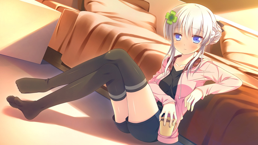 1girl bed black_legwear black_thighhighs blue_eyes blush clover_days collarbone female game_cg hood hoodie kagami_hikaru long_sleeves looking_at_viewer narumi_yuu_(bunbukudou) pillow shorts sitting smile solo thighhighs white_hair