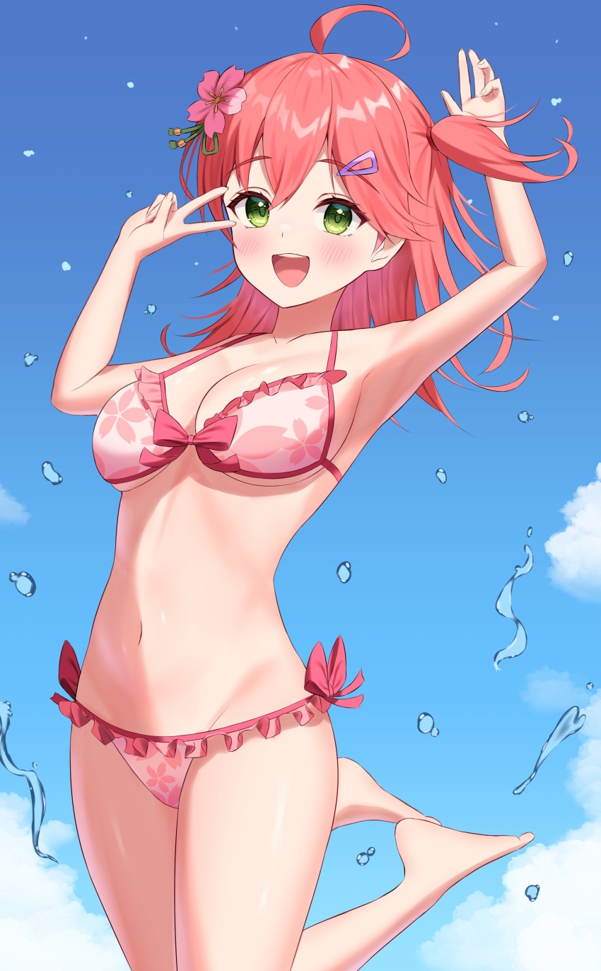 1girl absurdres ahoge bikini blue_sky breasts cherry_blossom_print cloud floral_print flower frilled_bikini frills green_eyes hair_flower hair_ornament hairclip highres hololive jumping kumoru_(kumoru_145) looking_at_viewer medium_breasts pink_bikini pink_hair sakura_miko sky solo swimsuit v_over_eye virtual_youtuber