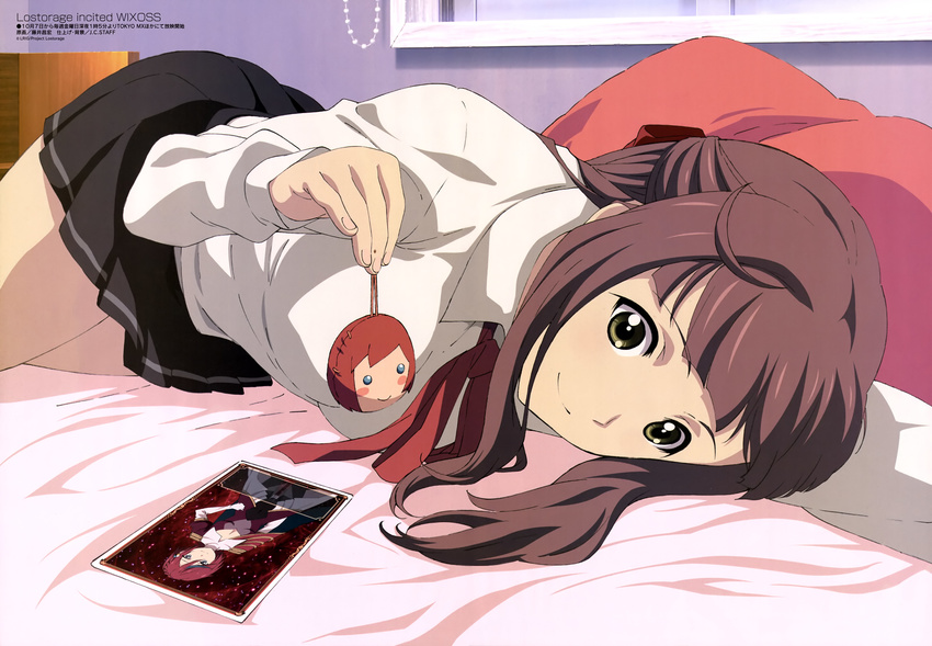 absurdres bed brown_hair card fujii_masahiro green_eyes half_updo highres homura_suzuko keychain long_hair lostorage_wixoss lying megami non-web_source official_art on_side ril_(wixoss) school_uniform smile wixoss