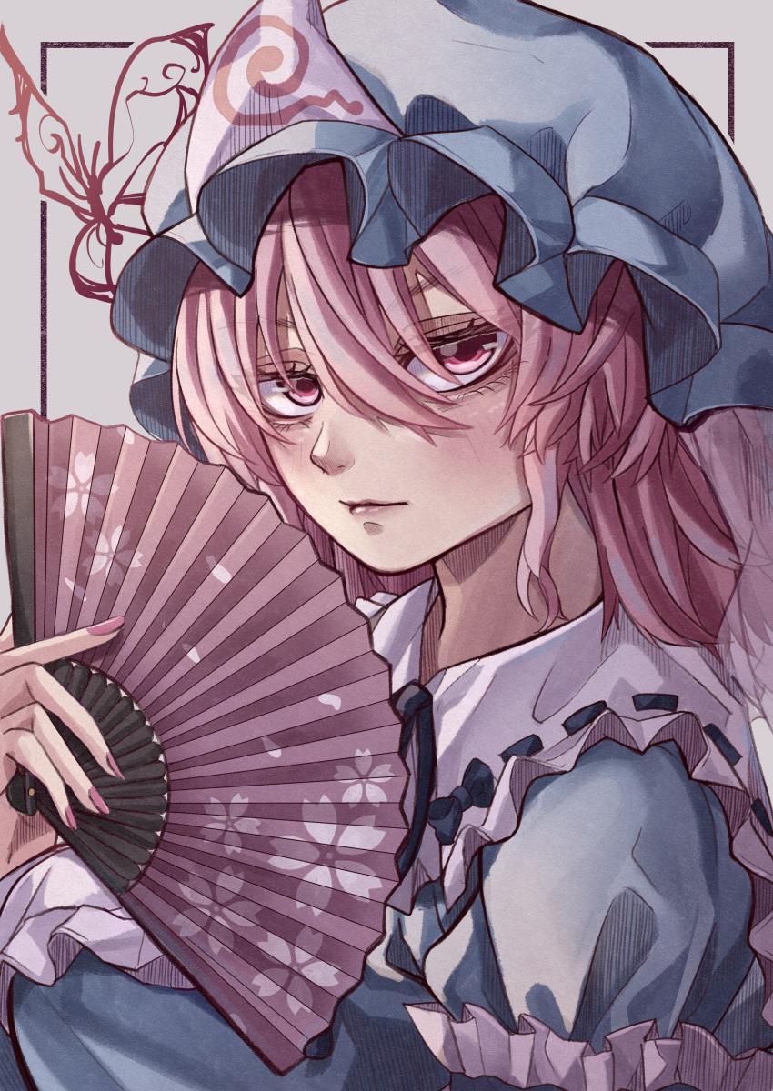 1girl absurdres blue_headwear blush cherry_blossom_print closed_mouth commentary_request eyelashes eyes_visible_through_hair floral_print folding_fan grey_background hair_between_eyes hand_fan hand_up hat highres holding holding_fan lips looking_at_viewer maboroshi_mochi medium_hair mob_cap pink_eyes pink_hair pink_nails saigyouji_yuyuko short_hair simple_background solo touhou triangular_headpiece tsurime upper_body v-shaped_eyebrows