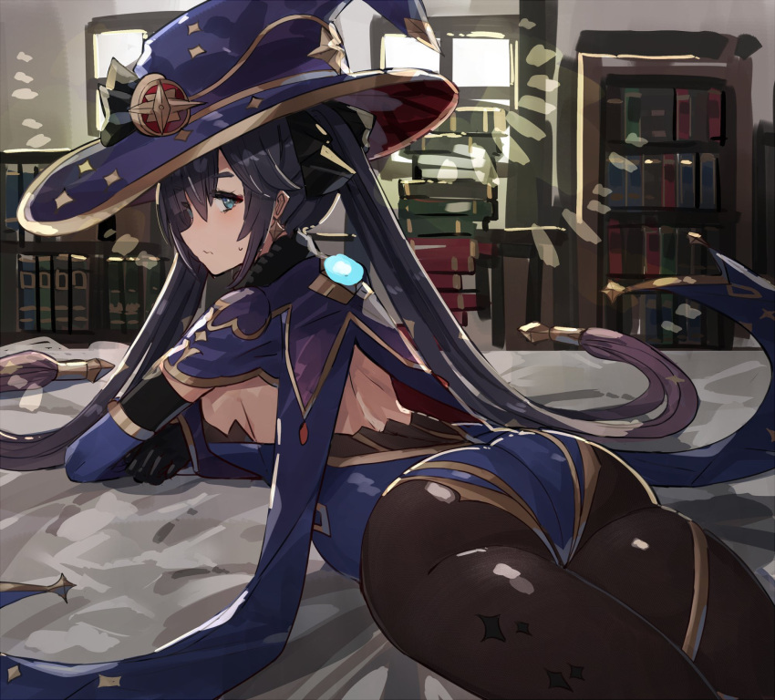 1girl ass black_gloves black_hair black_pantyhose blue_capelet blue_eyes blue_headwear blue_leotard book book_stack capelet commentary_request genshin_impact gloves hat highres indoors leotard long_hair looking_at_viewer lying mona_(genshin_impact) on_stomach pantyhose solo the_olphy thighs twintails very_long_hair witch_hat