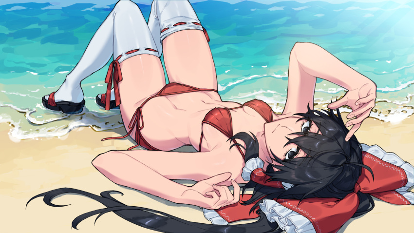 1girl armpits beach bikini black_eyes black_hair bow breasts closed_mouth commission day full_body hair_between_eyes hair_bow hair_tubes hakurei_reimu highres himadera long_hair looking_at_viewer lying ocean on_back outdoors red_bikini red_bow revision side-tie_bikini_bottom sidelocks skeb_commission solo swimsuit thighhighs touhou twitter_username water white_thighhighs