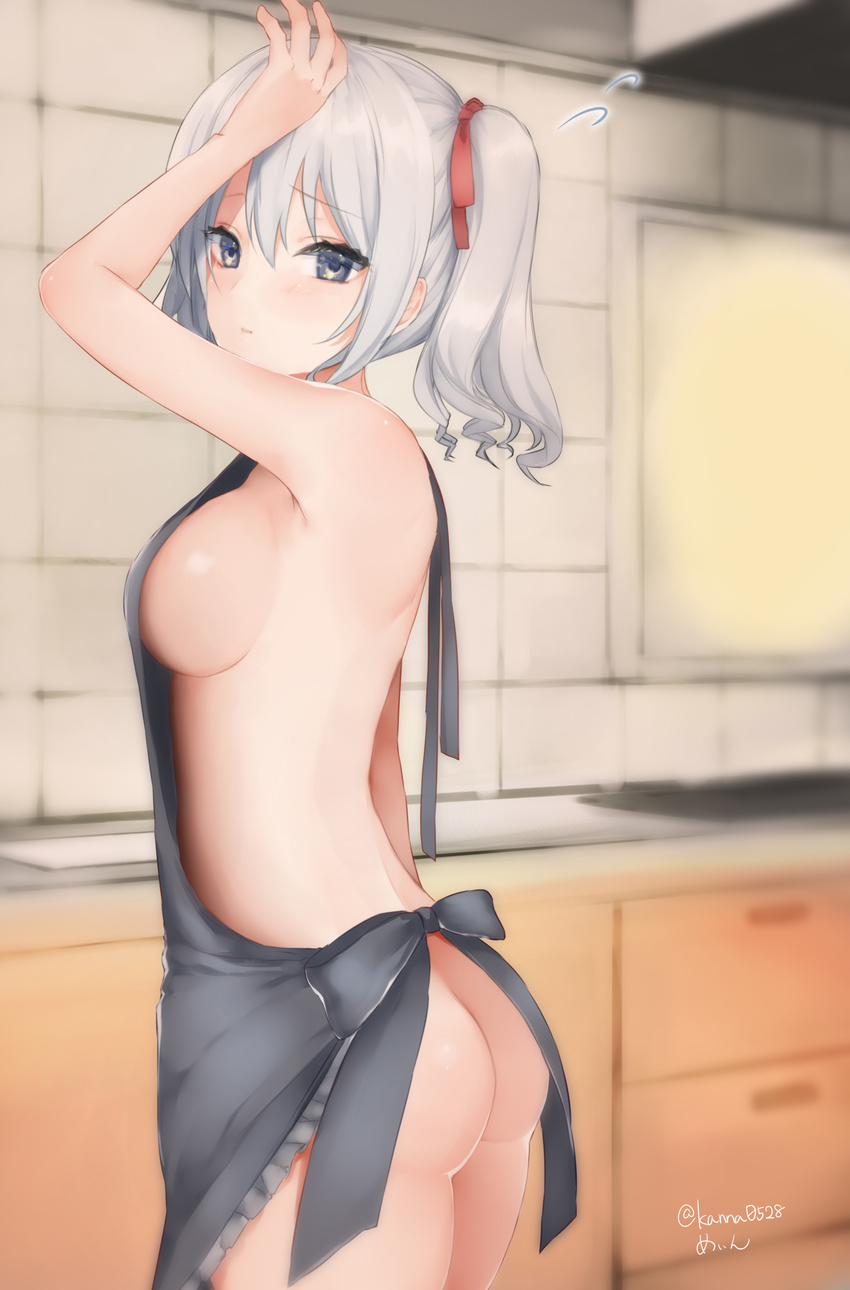 apron arm_at_side ass blurry breasts cowboy_shot depth_of_field flying_sweatdrops from_side hair_between_eyes highres indoors kantai_collection kashima_(kantai_collection) kitchen large_breasts looking_at_viewer naked_apron sakiryo_kanna sideboob silver_hair solo thighs twintails twitter_username wavy_hair