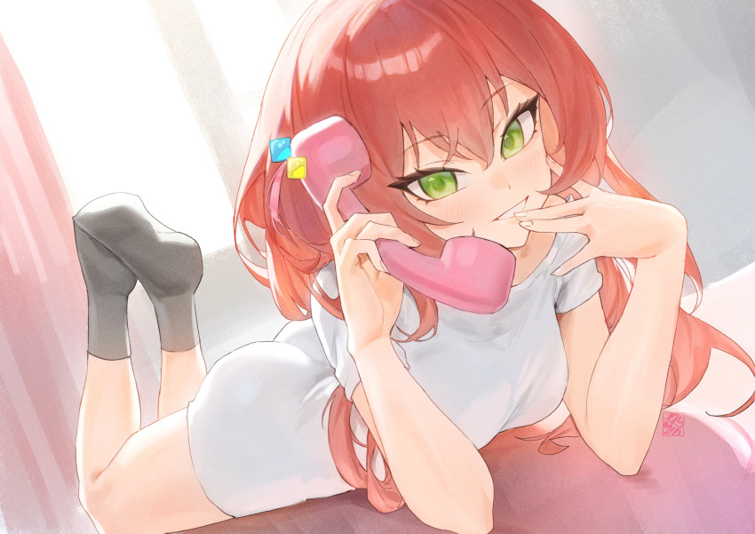 1girl antique_phone ass bed black_socks blush bocchi_the_rock! breasts commentary cube_hair_ornament feet_up fingerless_gloves full_body gloves green_eyes grin hair_ornament hashtag_only_commentary highres holding holding_phone hymin indoors kita_ikuyo long_hair long_shirt looking_at_viewer lying medium_breasts no_shoes on_bed on_stomach phone red_eyes shirt smile socks solo symbol-only_commentary talking_on_phone the_pose white_shirt