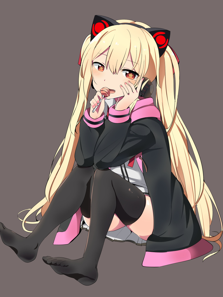 1girl absurdres azur_lane black_legwear blonde_hair candy cat_ear_headphones commentary_request concord_(azur_lane) eyebrows_visible_through_hair fang feet food hand_on_own_face headphones highres jacket lollipop long_hair long_sleeves looking_at_viewer mole mole_under_eye no_shoes open_mouth simple_background sitting solo star star-shaped_pupils symbol-shaped_pupils thighhighs toes tonari_(ichinichime_azuma) twintails very_long_hair