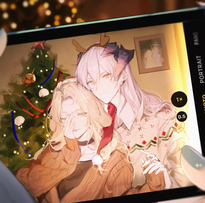 2girls animal_ears arknights black_choker blonde_hair blue_eyes blue_nails blurry blurry_background brown_cardigan cardigan cellphone choker christmas christmas_tree closed_mouth collared_shirt commentary couple depth_of_field dog_ears dog_girl earclip fake_antlers hair_between_eyes highres holding_hands horns joshua_(shisanli934) kristen_(arknights) long_hair long_sleeves looking_at_viewer multiple_girls nail_polish one_eye_closed orange_eyes phone saria_(arknights) selfie shirt sleeves_past_wrists smartphone symbol-only_commentary tongue tongue_out upper_body viewfinder white_hair white_shirt yuri