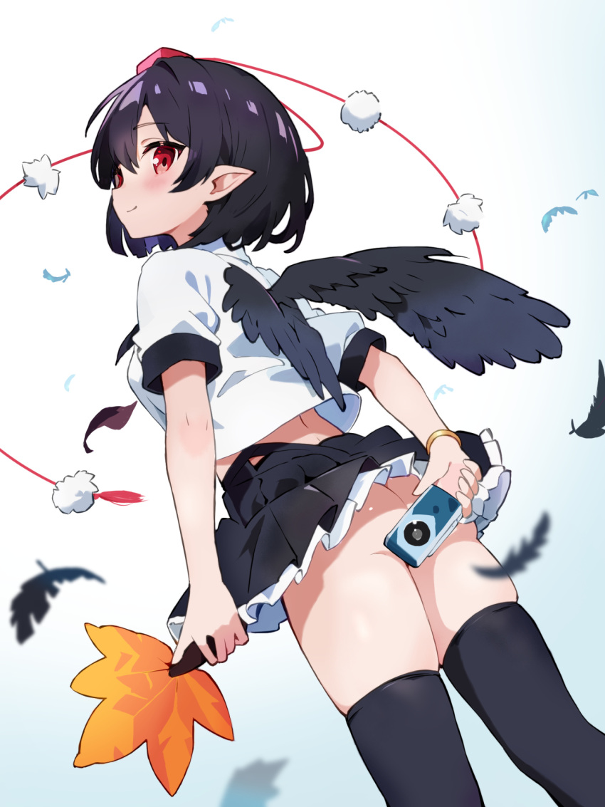 1girl ass black_hair black_skirt black_thighhighs black_wings camera chikuzen1996 collared_shirt covering_ass covering_privates crop_top falling_feathers feathered_wings feathers frilled_skirt frills from_below gold_bracelet gradient_background hair_intakes hat highres holding holding_camera holding_leaf leaf light_blush looking_at_viewer looking_back no_panties pleated_skirt pointy_ears pom_pom_(clothes) red_eyes red_hat shameimaru_aya shirt short_hair short_sleeves sidelocks simple_background skirt smile thighhighs tokin_hat touhou white_shirt wings