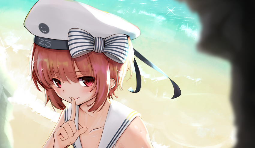beach beret bikini bow clothes_writing collarbone day eyebrows_visible_through_hair finger_to_mouth hat highres index_finger_raised kamome_donburi kantai_collection red_eyes sailor_collar sailor_hat sand short_hair smile solo striped striped_bow swimsuit white_bikini white_hat z3_max_schultz_(kantai_collection)