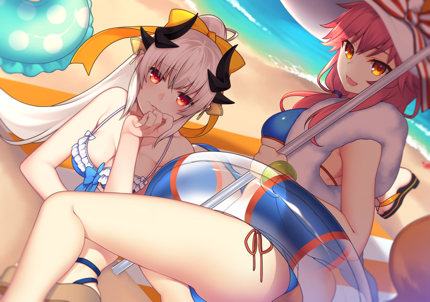 :3 :d bare_shoulders beach bikini blue_bikini bow bracelet breasts chin_rest cleavage day dutch_angle eyebrows_visible_through_hair fate/grand_order fate_(series) hair_bow hat horns innertube jewelry kiyohime_(fate/grand_order) lio_(tsukuyomi-tei) long_hair looking_at_viewer lying medium_breasts multiple_girls on_stomach open_mouth orange_eyes outdoors parted_lips pink_hair ponytail red_eyes sandals side-tie_bikini sitting smile smirk sun_hat swimsuit tail tamamo_(fate)_(all) tamamo_no_mae_(fate) tamamo_no_mae_(swimsuit_lancer)_(fate) white_hair yokozuwari