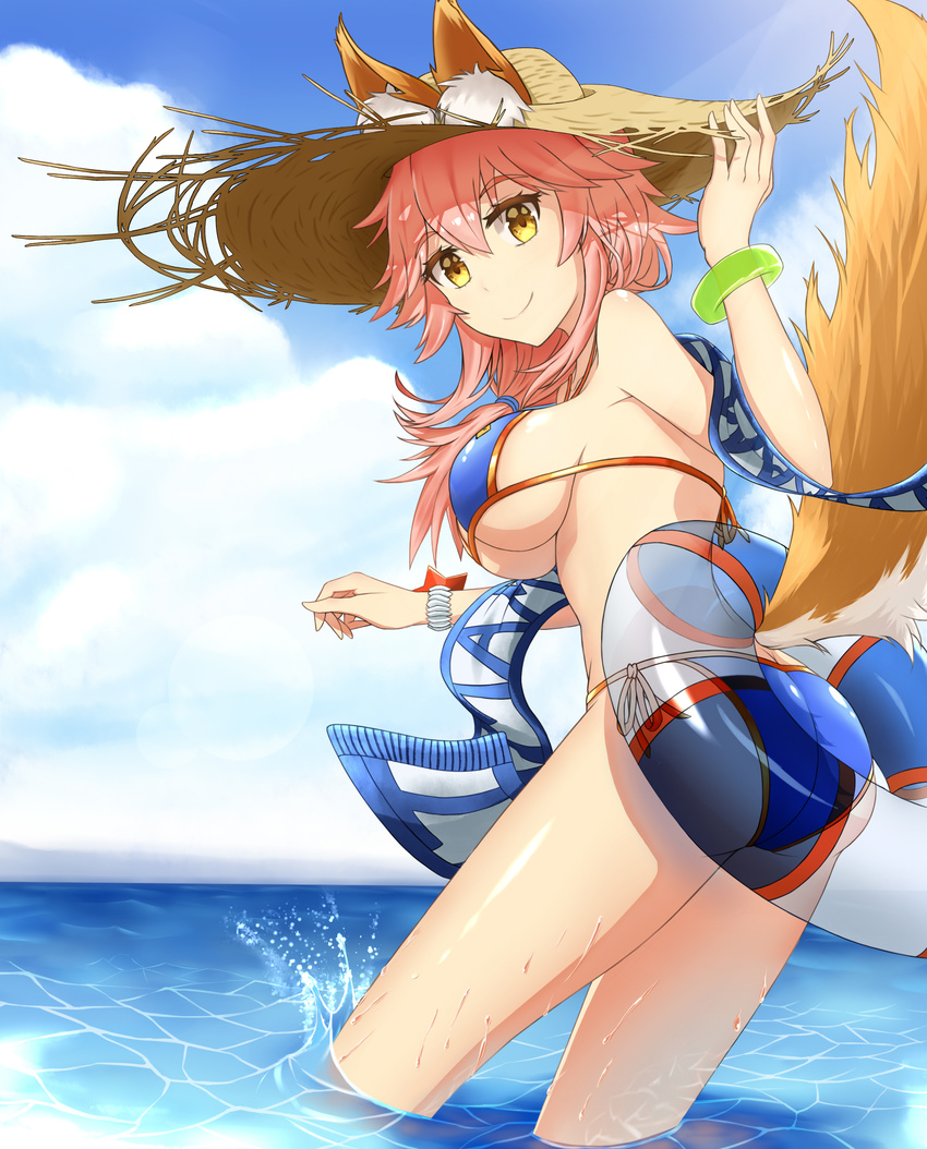 absurdres animal_ears ass bikini blue_bikini blush breasts cleavage day drums_(zzszsz2333) ears_through_headwear fate/grand_order fate_(series) fox_ears fox_tail hat highres innertube large_breasts long_hair looking_at_viewer ocean outdoors pink_hair solo straw_hat sun_hat swimsuit tail tamamo_(fate)_(all) tamamo_no_mae_(fate) tamamo_no_mae_(swimsuit_lancer)_(fate) underboob water yellow_eyes