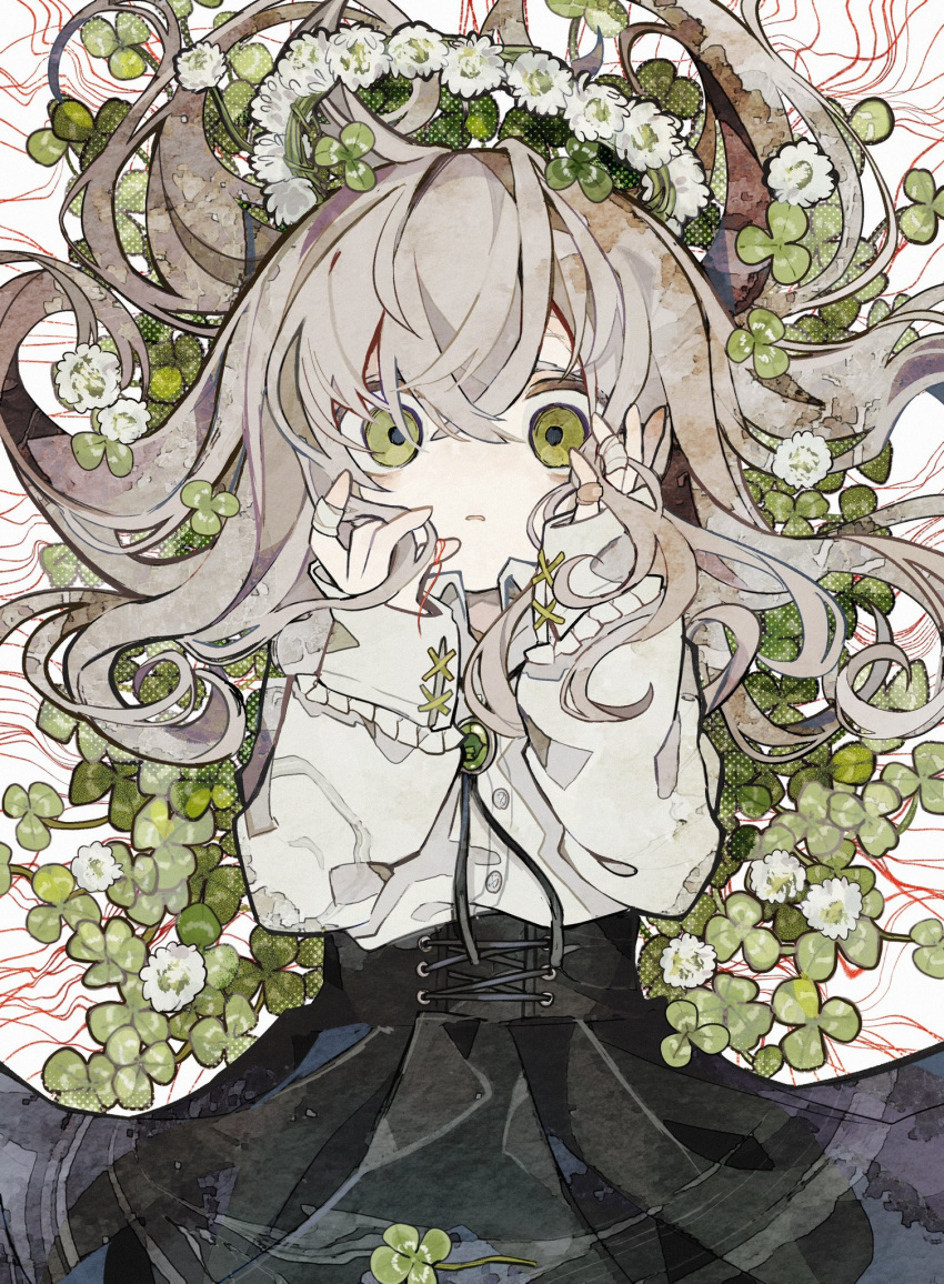 1girl bandaid bandaid_on_hand black_skirt bolo_tie brooch buttons clover clover_(flower) flower from_above gem green_eyes green_gemstone grey_hair hair_between_eyes hands_on_own_cheeks hands_on_own_face head_wreath highres jewelry long_hair long_sleeves looking_at_viewer lying on_back original shirt simple_background skirt sleeves_past_wrists solo soresaki string string_around_finger string_of_fate white_background white_flower white_shirt