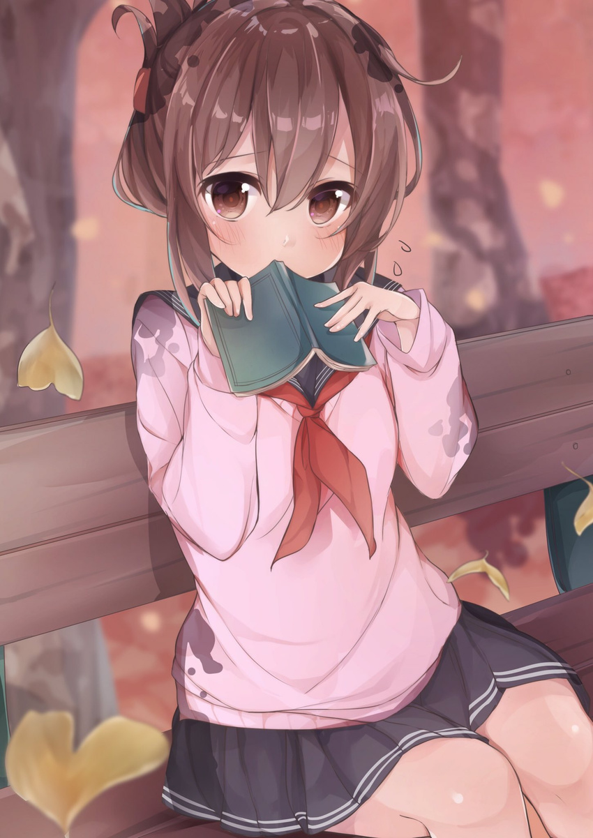 bench blue_skirt blush book book_to_mouth brown_hair cardigan folded_ponytail highres holding holding_book inazuma_(kantai_collection) kantai_collection leaf long_hair long_sleeves looking_at_viewer mochi_nabe neckerchief pleated_skirt red_neckwear school_uniform serafuku sitting skirt solo