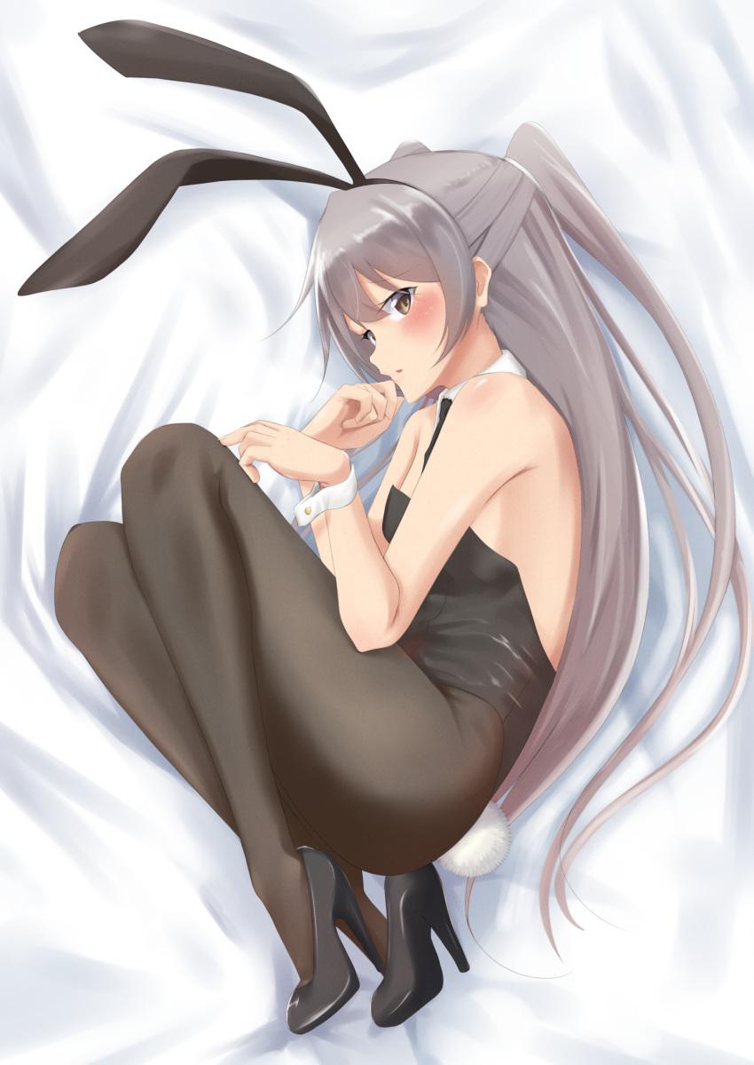 absurdres amatsukaze_(kantai_collection) animal_ears bed black_leotard black_neckwear brown_eyes bunny_ears bunny_tail bunnysuit commentary_request detached_collar fetal_position flat_chest from_above full_body highres joji kantai_collection leotard long_hair looking_at_viewer lying necktie on_side pantyhose silver_hair solo strapless strapless_leotard tail two_side_up wrist_cuffs