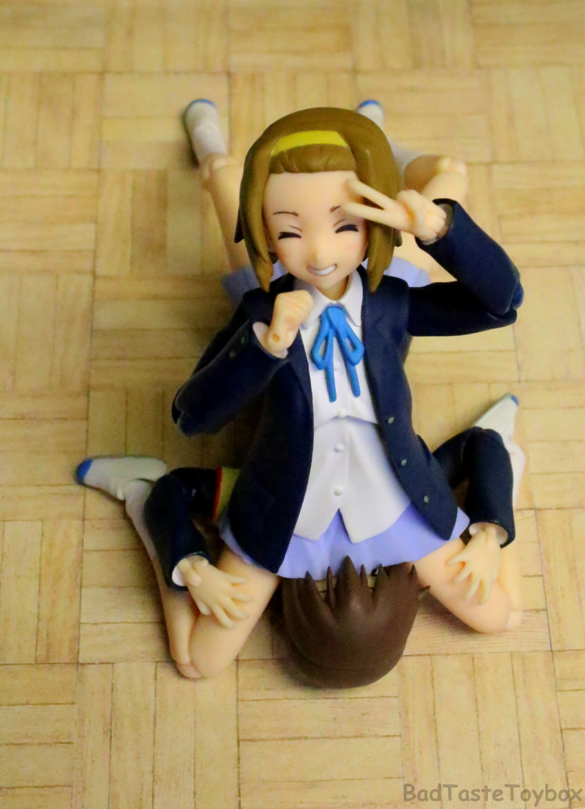 badtastetoybox brown_hair closed cunnilingus eyes face_sitting hairband hands_on_legs implied_cunnilingus k-on! manabe_nodoka minishirt oral oral_sex photo school_uniform schoolgirl tainaka_ritsu wood_floor yellow_hairband