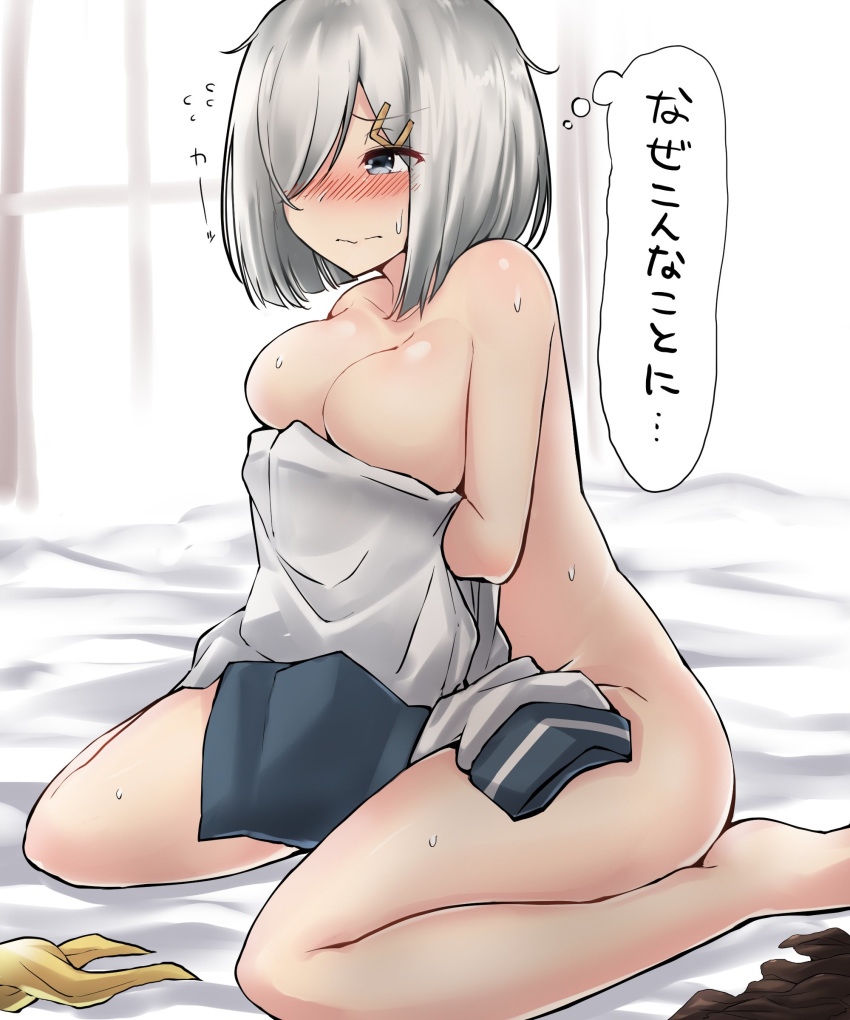 absurdres blue_eyes blush breasts cleavage closed_mouth clothes_removed collarbone commentary_request covering covering_breasts embarrassed from_side hair_ornament hair_over_one_eye hairclip hamakaze_(kantai_collection) highres holding_clothes indoors kantai_collection kiritto kneeling large_breasts messy_hair nose_blush nude on_bed pantyhose pantyhose_removed school_uniform serafuku shirt_removed short_hair silver_hair sitting solo sweat translated wariza window