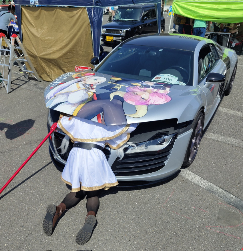 1girl audi audi_r8 aura_(sousou_no_frieren) belt black_belt black_pantyhose boots brown_footwear capelet car cosplay_photo frieren frieren_stuck_in_a_mimic_(meme) grey_car grey_hair highres hoshino_mami_(ma5mi2ta3n) itasha long_hair meme motor_vehicle pantyhose photo_(medium) skirt solo sousou_no_frieren sports_car tent twintails vehicle_focus very_long_hair white_capelet white_skirt