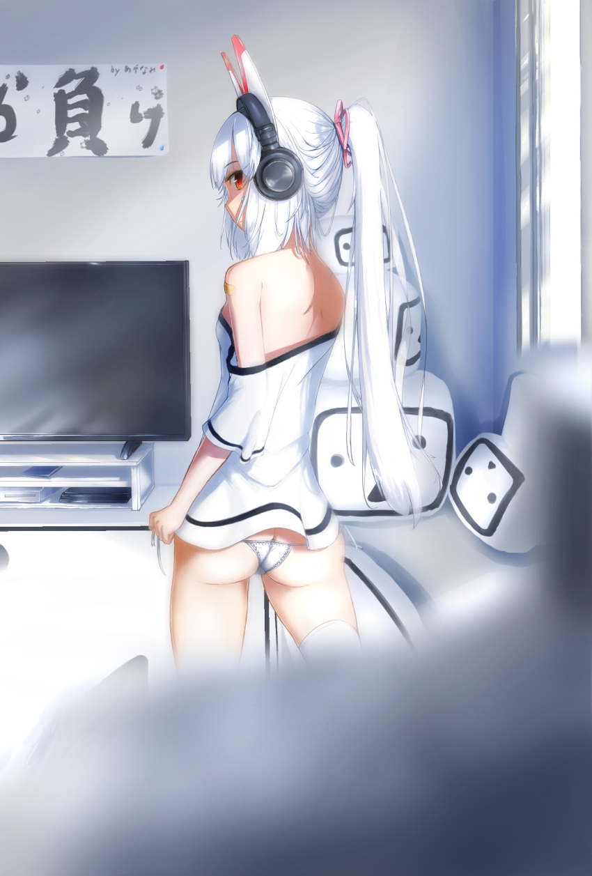 ass ayanami_(azur_lane) azur_lane bandaid_on_arm bangs bare_shoulders bergreisfeld blurry blurry_foreground breasts butt_crack closed_mouth commentary_request depth_of_field eyebrows_visible_through_hair flat_screen_tv from_behind hair_between_eyes hair_ribbon headgear headphones high_ponytail highres indoors long_hair looking_at_viewer looking_back lowleg lowleg_panties no_pants off-shoulder_shirt panties pink_ribbon ponytail profile ribbon shirt side-tie_panties sidelocks silver_hair small_breasts solo television terebi-chan thighhighs underwear very_long_hair white_legwear white_panties white_shirt window