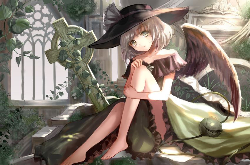 adapted_costume barefoot black_hat black_wings brooch celtic_cross closed_mouth collarbone cross dress eyebrows_visible_through_hair feathered_wings frilled_dress frills green_dress green_eyes grey_hair hat hat_ribbon head_tilt ivy jewelry keiko_(mitakarawa) knee_to_chest knee_up komeiji_koishi leg_hug light_frown looking_at_viewer off-shoulder_dress off_shoulder on_floor overgrown pensive plant ribbon ruins short_hair single_wing sitting solo sun_hat sunlight third_eye touhou white_ribbon wings