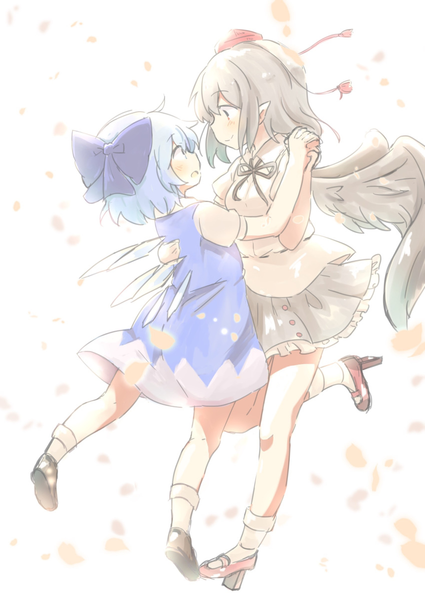 2girls absurdres bird_wings black_hair blue_eyes blue_hair blush bow breasts cirno collared_shirt dancing dress eye_contact female flying geta hair_bow hand_holding hand_on_another's_back hat highres ice ice_wings interlocked_fingers kototoki large_bow medium_breasts multiple_girls open_mouth petals pointy_ears red_eyes ribbon shameimaru_aya shirt shoes short_hair skirt smile tengu-geta tokin_hat touhou white_background wings yuri