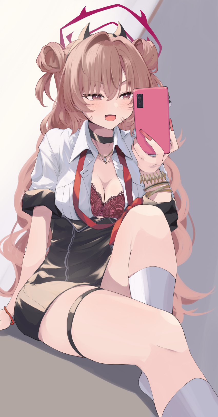 1girl absurdres black_choker black_skirt blue_archive blush bra breasts cellphone choker cleavage collarbone double_bun fake_horns fang fingernails hair_bun halo highres holding holding_phone horns jewelry kirara_(blue_archive) kumoi_sora large_breasts long_fingernails long_hair nail_polish necklace open_mouth phone pink_eyes pink_hair red_bra red_halo red_nails short_sleeves skirt smartphone socks solo thigh_strap underwear white_socks