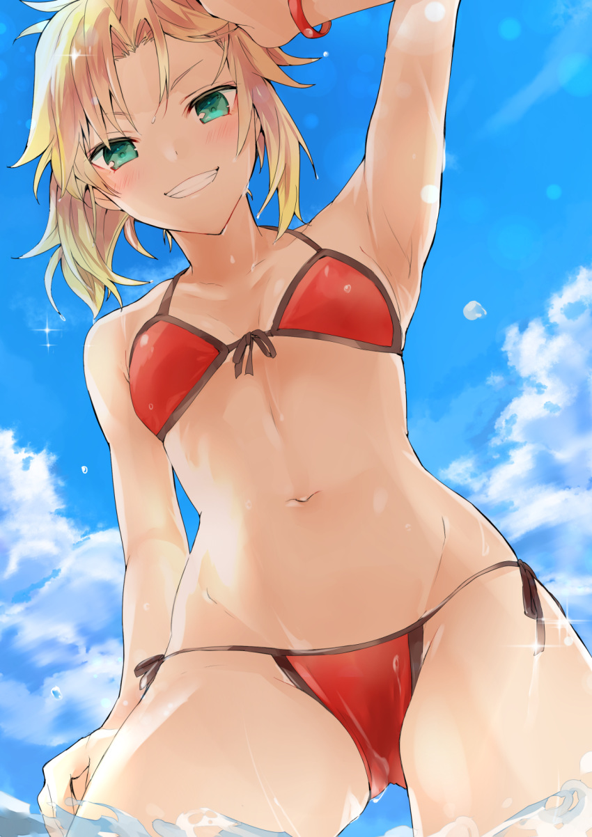 arm_up armpits bangs bare_arms bare_shoulders bikini blonde_hair blue_sky breasts cloud collarbone commentary_request day dutch_angle eyebrows_visible_through_hair fate/grand_order fate_(series) from_below front-tie_bikini front-tie_top green_eyes grin groin highres looking_at_viewer looking_down mordred_(fate)_(all) mordred_(swimsuit_rider)_(fate) navel outdoors red_bikini side-tie_bikini sky small_breasts smile solo stomach swimsuit tan tomozero water wet wet_hair