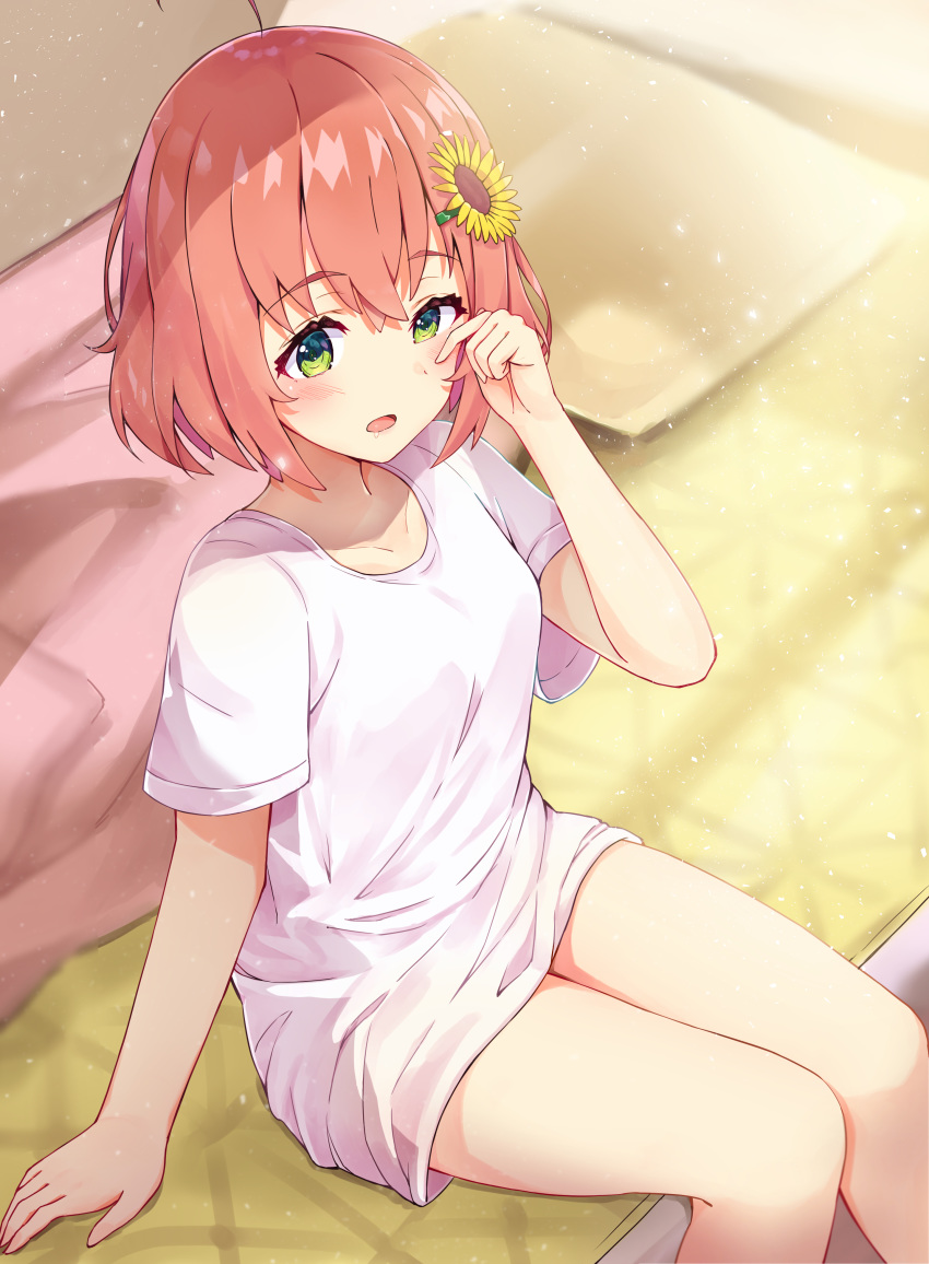 absurdres ahoge bangs blush breasts collarbone commentary_request drooling eyebrows_visible_through_hair eyelashes flower green_eyes hair_between_eyes hair_flower hair_ornament highres honma_himawari indoors medium_breasts nijisanji on_bed open_mouth orange_hair racchi. rubbing_eyes shirt short_hair sitting sitting_on_bed sleepy sunflower_hair_ornament t-shirt virtual_youtuber waking_up white_shirt