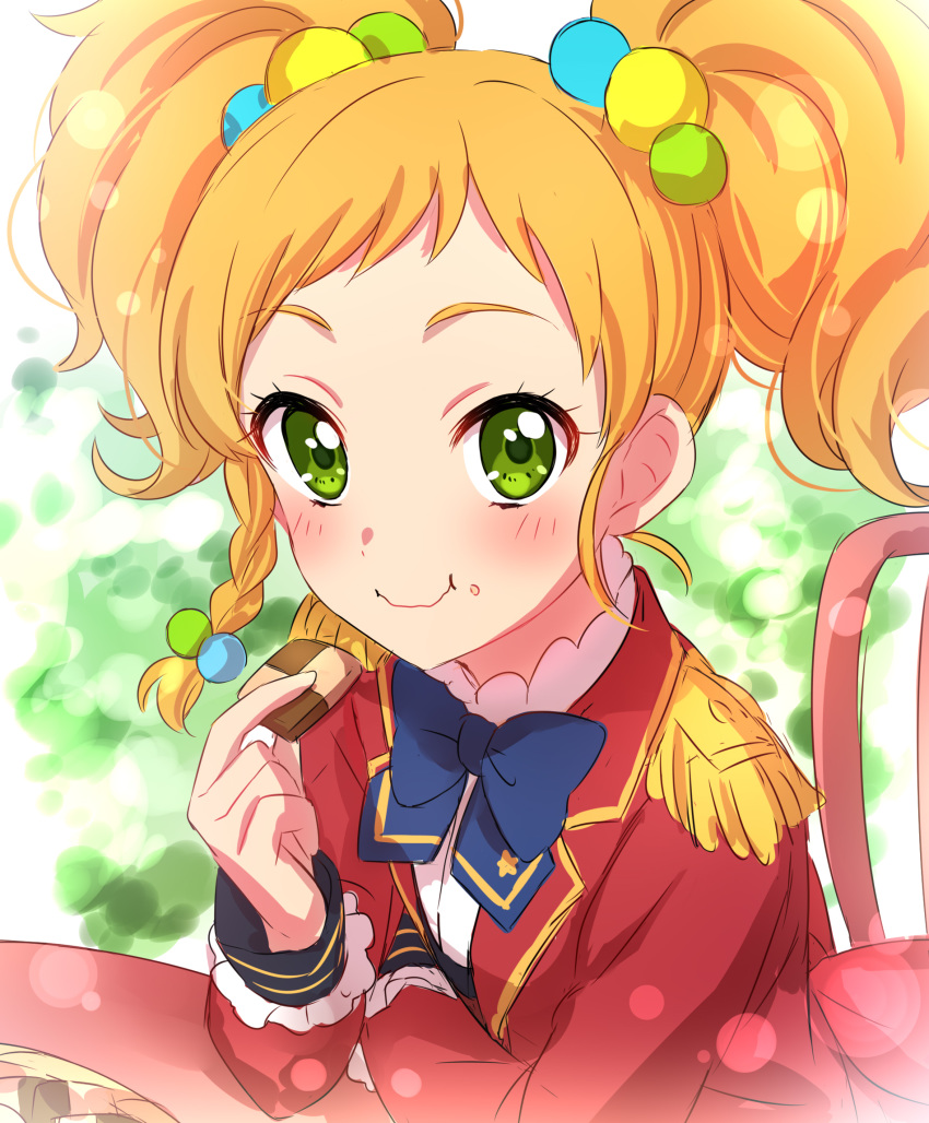 :t aikatsu!_(series) aikatsu_stars! blue_neckwear blush bow bowtie braid checkerboard_cookie chocolate closed_mouth commentary_request cookie eating epaulettes food food_on_face green_eyes hair_bobbles hair_ornament highres holding holding_food jacket lens_flare lens_flare_abuse long_sleeves looking_at_viewer multicolored_hair_bobbles nikaidou_yuzu orange_hair red_jacket s4_uniform sekina short_hair side_braid single_braid smile solo twintails wavy_mouth
