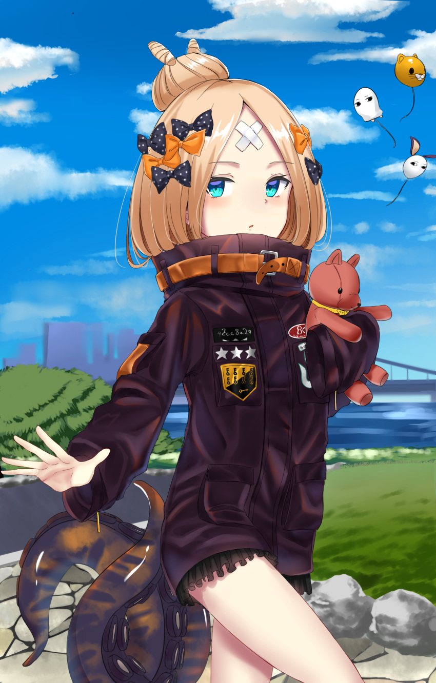 abigail_williams_(fate/grand_order) bangs black_bow black_jacket blonde_hair blue_eyes blue_sky blush bow cityscape cloud commentary_request crossed_bandaids day eyebrows_visible_through_hair fate/grand_order fate_(series) hair_bow hair_bun heroic_spirit_traveling_outfit highres jacket jun_(540000000000000) key long_hair long_sleeves looking_at_viewer medjed object_hug orange_bow outdoors parted_bangs parted_lips polka_dot polka_dot_bow river sky sleeves_past_fingers sleeves_past_wrists solo standing star stuffed_animal stuffed_toy suction_cups teddy_bear tentacles water