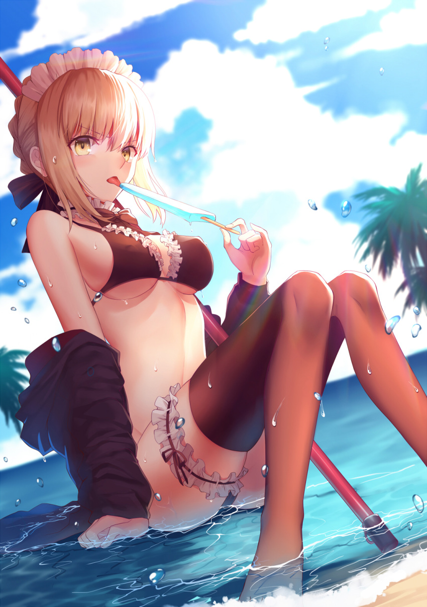 artoria_pendragon_(all) artoria_pendragon_(swimsuit_rider_alter) bangs beach bikini black_bikini black_bow black_jacket black_legwear blonde_hair bow braid breasts cloud commentary_request covered_nipples day dutch_angle eyebrows_visible_through_hair fate/grand_order fate_(series) food french_braid frilled_bikini frills gogatsu_fukuin hair_bow highres holding holding_food jacket knees_together_feet_apart knees_up looking_at_viewer maid_headdress medium_breasts mop ocean off_shoulder open_clothes open_jacket open_mouth outdoors palm_tree popsicle sitting solo swimsuit thigh_strap thighhighs tongue tongue_out tree water wet yellow_eyes
