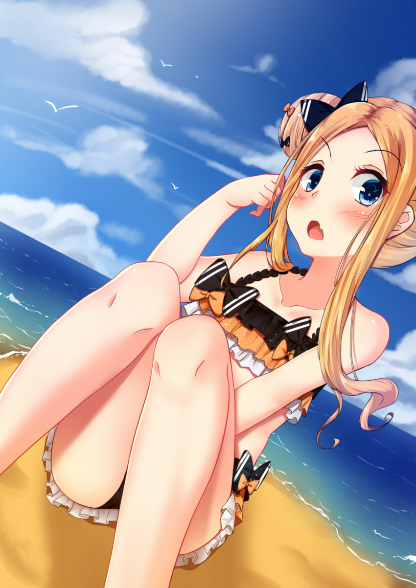 abigail_williams_(fate/grand_order) bangs bare_shoulders beach bikini black_bikini black_bow blonde_hair blue_eyes blue_sky blush bow collarbone commentary_request day double_bun emerald_float fang fate/grand_order fate_(series) forehead frilled_bikini frills hair_bow highres knees_up legs long_hair looking_at_viewer ocean open_mouth orange_bow parted_bangs sitting sky solo striped striped_bow swimsuit thighs zhai_mu_q