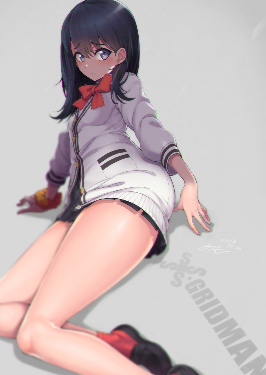 ayaki bangs black_hair black_skirt blue_eyes blurry blush cardigan closed_mouth commentary_request depth_of_field eyebrows_visible_through_hair highres loafers long_hair long_sleeves looking_at_viewer lying on_side pleated_skirt red_legwear red_neckwear school_uniform scrunchie shirt shoes skirt solo ssss.gridman takarada_rikka thighs white_shirt wrist_scrunchie