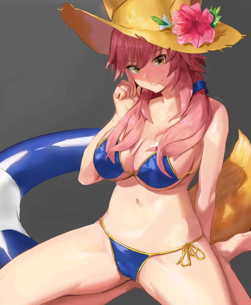 absurdres animal_ears bangs bare_shoulders bikini blue_bikini blue_ribbon blush breasts cleavage closed_mouth collarbone commentary_request ears_through_headwear fate/extra fate/grand_order fate_(series) flower fox_ears fox_tail grey_background hair_between_eyes hair_ribbon hat hat_flower highres innertube large_breasts long_hair looking_at_viewer low_twintails navel pink_hair ribbon side-tie_bikini sidelocks simple_background smile solo straw_hat sun_hat swimsuit tail tamamo_(fate)_(all) tamamo_no_mae_(swimsuit_lancer)_(fate) twintails uronte yellow_eyes