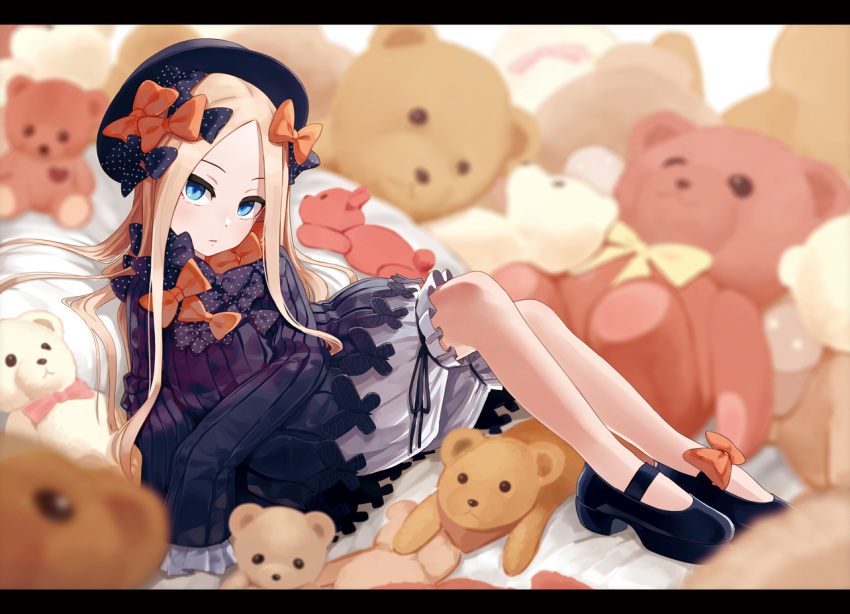 abigail_williams_(fate/grand_order) bangs black_bow black_dress black_footwear black_hat blonde_hair blue_eyes blurry blurry_background bow dress fate/grand_order fate_(series) forehead hair_bow hat leaning_back legs long_hair looking_at_viewer omaru_gyuunyuu orange_bow parted_bangs parted_lips pillow polka_dot polka_dot_bow ribbed_dress sitting sleeves_past_fingers sleeves_past_wrists solo stuffed_animal stuffed_toy teddy_bear white_bloomers
