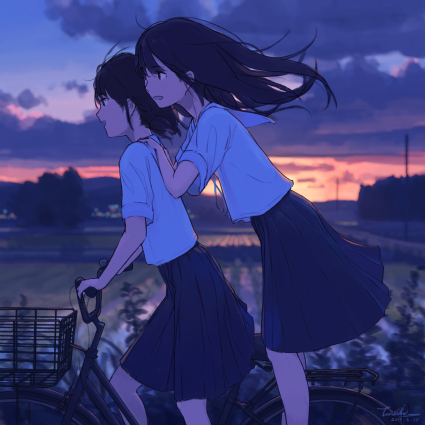 2girls backlighting bicycle bicycle_basket black_eyes black_hair blurry cloud cloudy_sky cruiser_bicycle dark dated depth_of_field ground_vehicle hands_on_another's_shoulders happy highres long_hair multiple_girls open_mouth original outdoors profile rice_paddy riding rural scenery school_uniform serafuku short_hair signature sketch sky standing sunset telephone_pole wind yakikoke