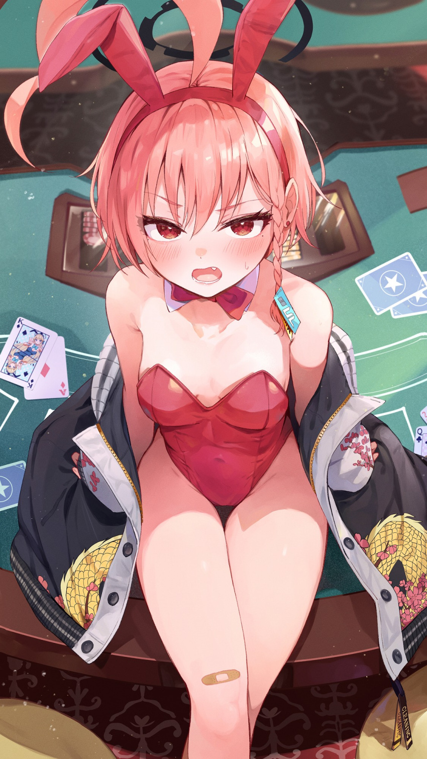 1girl ace_(playing_card) ace_of_diamonds ahoge animal_ears bandaid bandaid_on_knee bandaid_on_leg bare_shoulders black_jacket blue_archive blurry blurry_background blush braid breasts card collarbone commentary covered_navel crossed_legs depth_of_field diamond_(shape) earrings fake_animal_ears fang feet_out_of_frame from_above groin hair_between_eyes hairband halo highres jacket jewelry leotard long_sleeves looking_at_viewer looking_up mole mole_under_eye neru_(blue_archive) neru_(bunny)_(blue_archive) off_shoulder open_clothes open_jacket open_mouth orange_hair playboy_bunny playing_card poker_table puffy_long_sleeves puffy_sleeves rabbit_ears racchi. red_eyes red_hairband red_leotard single_braid sitting sleeves_past_wrists small_breasts solo strapless strapless_leotard stud_earrings sukajan table toki_(blue_archive) toki_(bunny)_(blue_archive)