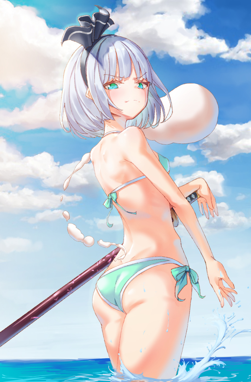 &gt;:( 1girl absurdres ass back bangs bare_arms bare_shoulders bikini black_ribbon blue_eyes blue_sky blunt_bangs breasts closed_mouth cloud day from_behind green_bikini green_eyes hair_ribbon halter_top halterneck highres ildy konpaku_youmu konpaku_youmu_(ghost) multicolored multicolored_eyes ocean outdoors ribbon scowl sheath sheathed short_hair silver_hair sky small_breasts solo splashing standing summer swimsuit sword touhou wading weapon