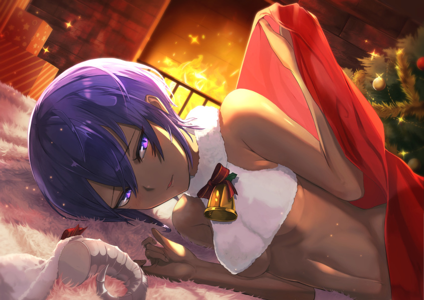 1girl announ_(kurotya) bangs bare_shoulders bauble bell blanket blush box breasts carpet christmas commentary_request crop_top crop_top_overhang dark_skin dutch_angle fate/grand_order fate_(series) fire fireplace gift gift_box hassan_of_serenity_(fate) highres indoors looking_at_viewer lying medium_breasts merry_sheep navel on_floor on_side parted_lips purple_eyes purple_hair red_ribbon ribbon short_hair smile solo sparkle under_covers underboob