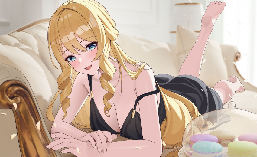 1girl absurdres alternate_costume barefoot black_dress blonde_hair blue_eyes blush breasts cleavage commentary couch dress drill_hair drill_sidelocks food full_body genshin_impact highres indoors jumonji lampshade large_breasts long_hair looking_at_viewer lying macaron navia_(genshin_impact) on_couch on_stomach open_mouth paid_reward_available petals sidelocks sleeveless sleeveless_dress smile soles solo strap_slip twin_drills
